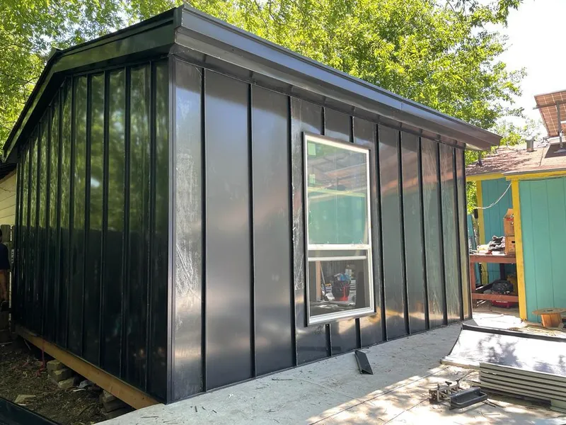 Black standing seam metal wall panels for Roof Inspection in Kent